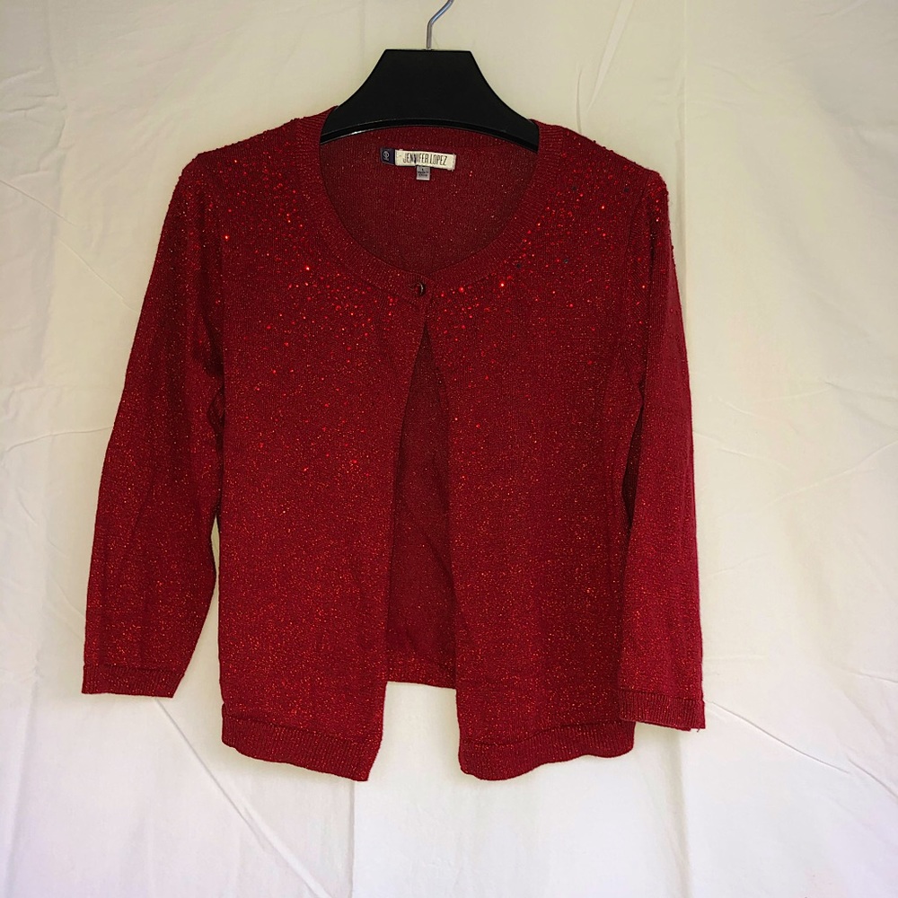red sparkly light sweater